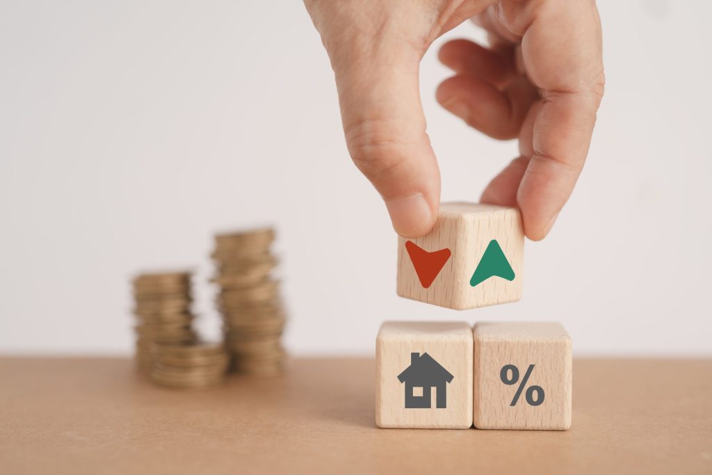 Blocks symbolizing house flipping in real estate investing.