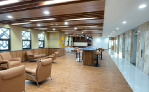 Modern office lounge showcasing carpet area.