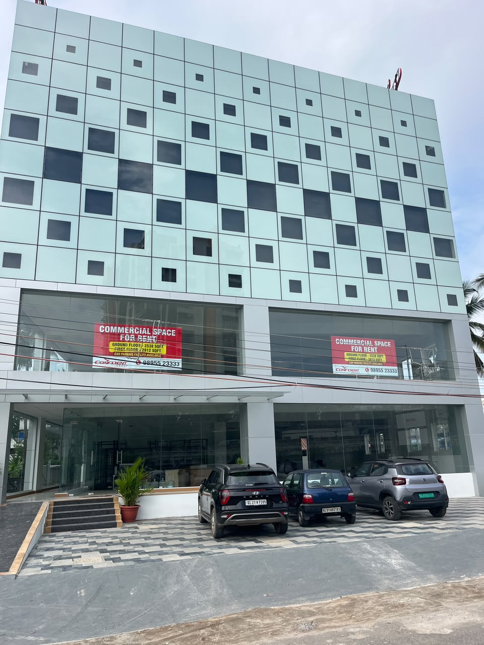 Building frontage with entrance and parking