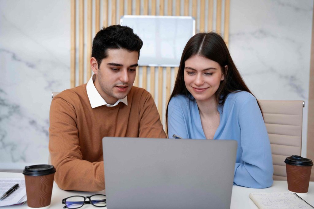 Couple researching things to check before buying a flat in Calicut.