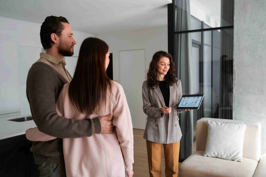 Agent discussing about details and salary to buy a flat in Kerala